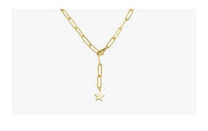 Macro detail of 18k gold plated paperclip chain with a minimalist star pendant