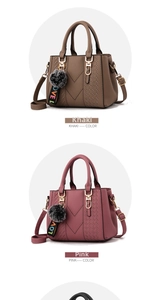 Detail view of khaki and pink leather handbags with V-shaped stitching and fur ball charms