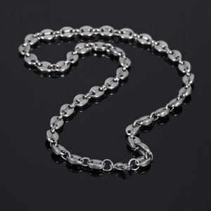 Detail shot of silver coffee bean link chain featuring a durable lobster claw clasp