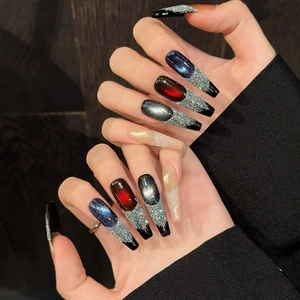 Long coffin press-on nails with blue and red cat eye effect and silver glitter finish