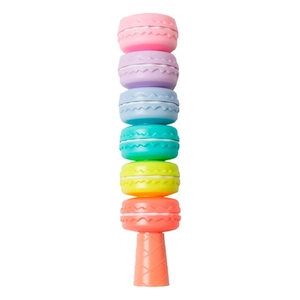 Macro shot of colorful macaron shaped building blocks stacked on a conical base