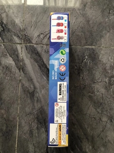 Detail of toy packaging showing CE certification and safety warning for children