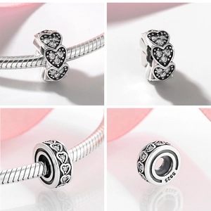 Macro detail of S925 sterling silver heart charm bead with zircon inlay for DIY bracelets