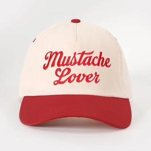 Retro baseball cap featuring cream crown and red brim with Mustache Lover embroidery
