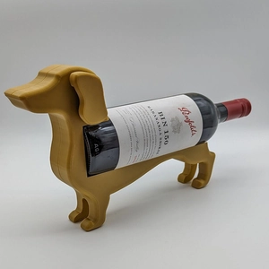 Creative yellow dachshund dog wine bottle holder made of durable 3D printed material