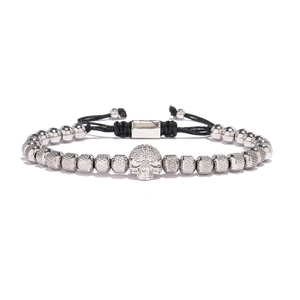 Close-up of skull beaded bracelet with sparkling zircon inlay and adjustable woven cord