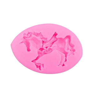 Pink silicone mold with unicorn carousel shape for fondant chocolate and clay crafting