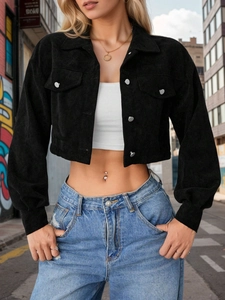 Detailed close-up showing the ribbed corduroy texture of this stylish black cropped jacket