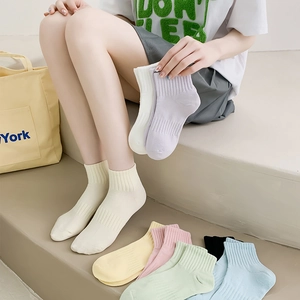 Women's thin cotton ankle socks in various macaron colors featuring breathable ribbed texture