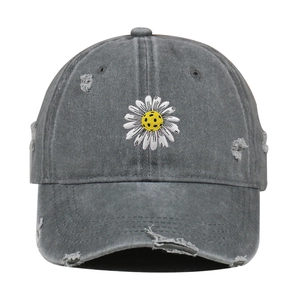 Vintage washed charcoal gray baseball cap with distressed details and daisy embroidery motif