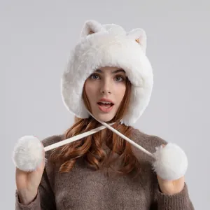Creamy white winter knit hat with cat ears and fluffy pom-pom earflaps for women