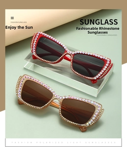Detail of luxury cat-eye sunglasses with rhinestone frames and polarized lenses