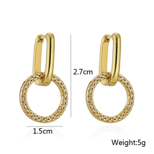 Detail view of gold geometric drop earrings with cubic zirconia and size measurements