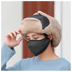 Detail view of khaki faux fur aviator hat with grey face mask for extreme winter warmth