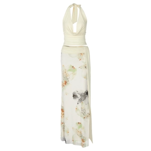 Detailed shot of halter neck top and long slit floral print skirt in two-piece set