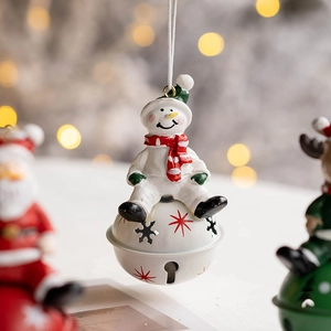 Festive Christmas snowman bell ornament with resin character and white snowflake metal bell