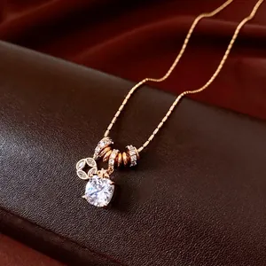 18k gold plated necklace featuring square zircon pendant and multilayered beads charms