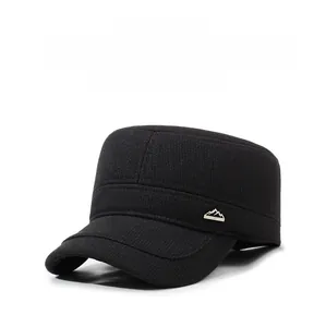 Detail view of winter flat top baseball cap with ear flaps and metallic accent
