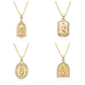 Detail of four gold-plated religious pendants with Virgin Mary relief and zircon stones