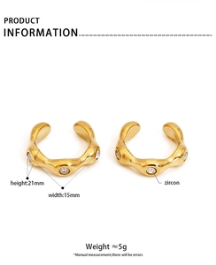 Macro detail of irregular gold zircon ear cuffs with 21mm height and 15mm width