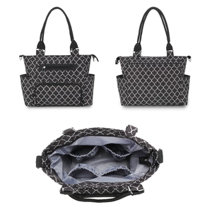 Detail view showing multi-pocket interior and black geometric pattern of the 7-piece diaper bag