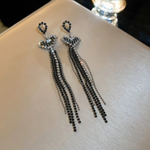 Silver needle tassel earrings with black teardrop crystal and sparkling butterfly design