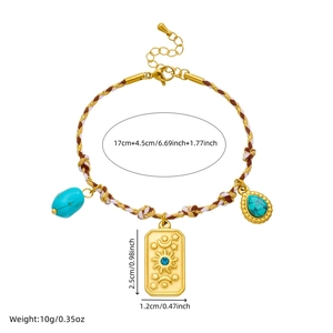 Bohemian braided rope bracelet with turquoise and gold embossed floral butterfly pendants