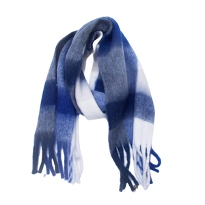 Close-up of blue and white checkered scarf featuring soft fringed tassels and cozy texture