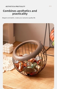 Macro view of a spherical wire coffee pod holder with COFFEE label on a wooden desk