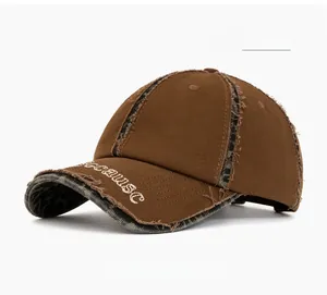 Detail of coffee cotton baseball cap featuring frayed edges and leopard print underbrim