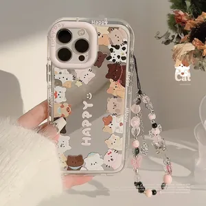 Close-up of cute cartoon cat patterns and pink Lucky Day camera frame on iPhone case