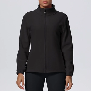 Detailed view of women's black fleece jacket with silver zipper and high neck stand collar