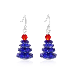 Close-up of patriotic Christmas tree earrings with red and blue beads and silver hooks
