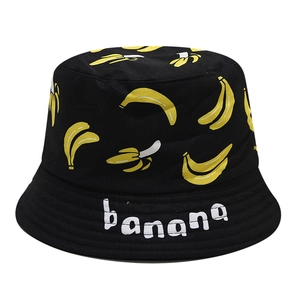 Bob réversible enfant noir avec imprimés bananes jaunes et texte décoratif