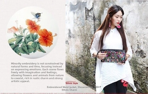 Detailed close-up of intricate ethnic floral embroidery on a black satin clutch bag