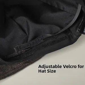 Detail view of the adjustable Velcro strap inside the vintage linen newsboy cap