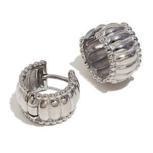 Minimalist silver twist earrings with textured ridges and beaded edge in polished finish
