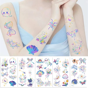 Holographic cartoon tattoo stickers with rainbow patterns including ghosts and butterflies
