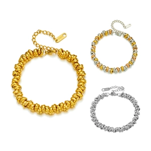Three twisted stainless steel bracelets in gold, silver and mixed tones with S.STEEL tags