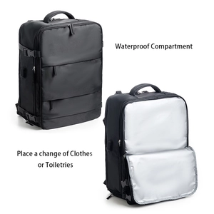 Detail view of the waterproof compartment for clothes and toiletries in the black backpack