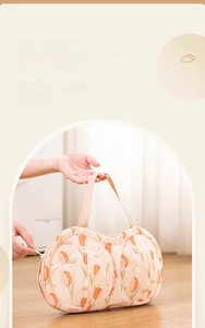 Detail of tulip mesh laundry bag with polyester fabric and portable handle for delicates