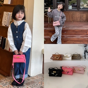 Micro mini bucket bag for children in multiple colors with gold hardware and top handle