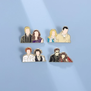 Set of four Twilight saga inspired metal enamel pins with minimalist character designs