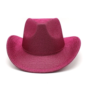Close-up of vibrant pink sequined cowboy hat with sparkling texture for party events