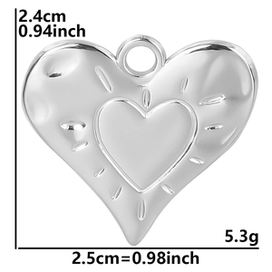 Detail showing dimensions of heart pendant with 2.4cm height and 2.5cm width specs