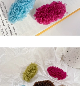 Close-up of candy-colored faux shearling hair clips with soft plush texture in various colors