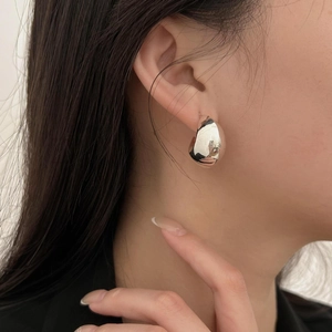 Polished 925 sterling silver chunky hoop earrings with a modern curved teardrop design