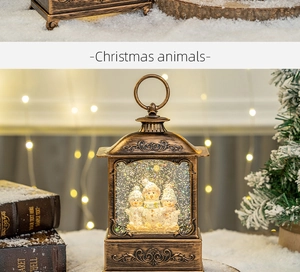 Detail of vintage bronze Christmas lantern with snowmen and swirling glitter