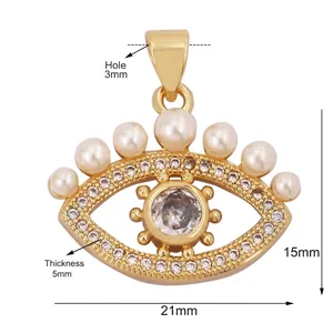 Evil eye lucky charm pendant with pearls and crystals, size 21x15mm in gold finish