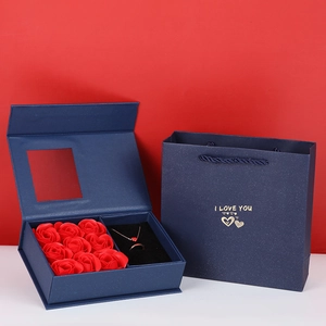 Navy blue jewelry gift box with red roses heart necklace and ring in a gift set